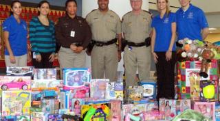 Pictured from L to R:  Ludivina Grace, Ana Mullins, Deputy Domitila Guerra, Deputy Frank Davis, Lt. Lester Phipps, Kristel Varnell, and Julio Corona.