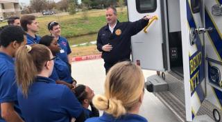 Chief Temple with  EMT students at the Missouri City Campus