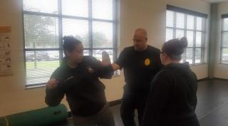 Employees training in self-defense